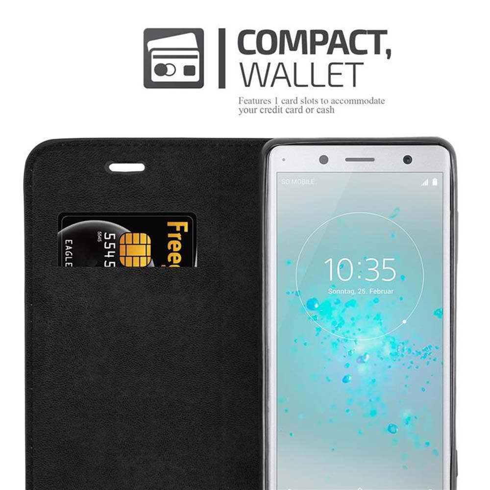 Portafoglio nero con carta di credito e smartphone. Lo schermo mostra le 10:35.