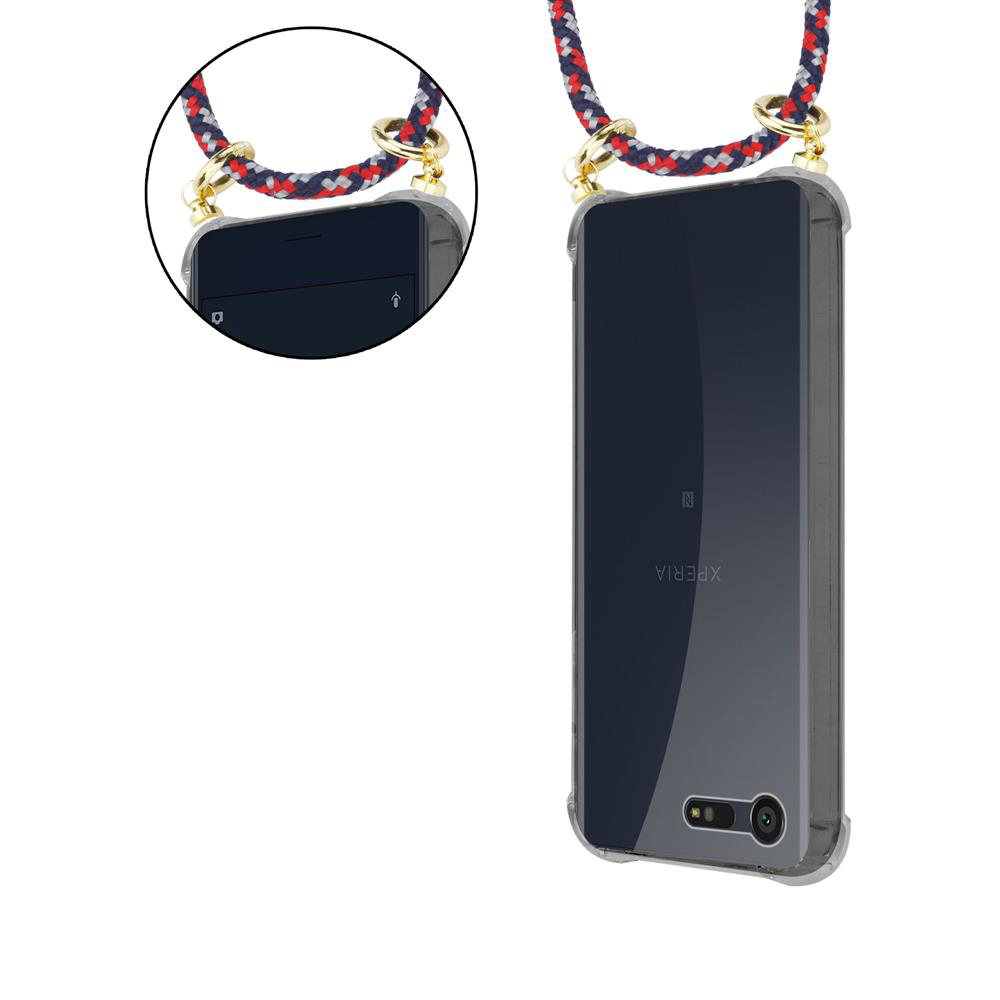 Un teléfono transparente con una correa colorida sujeta a las esquinas.