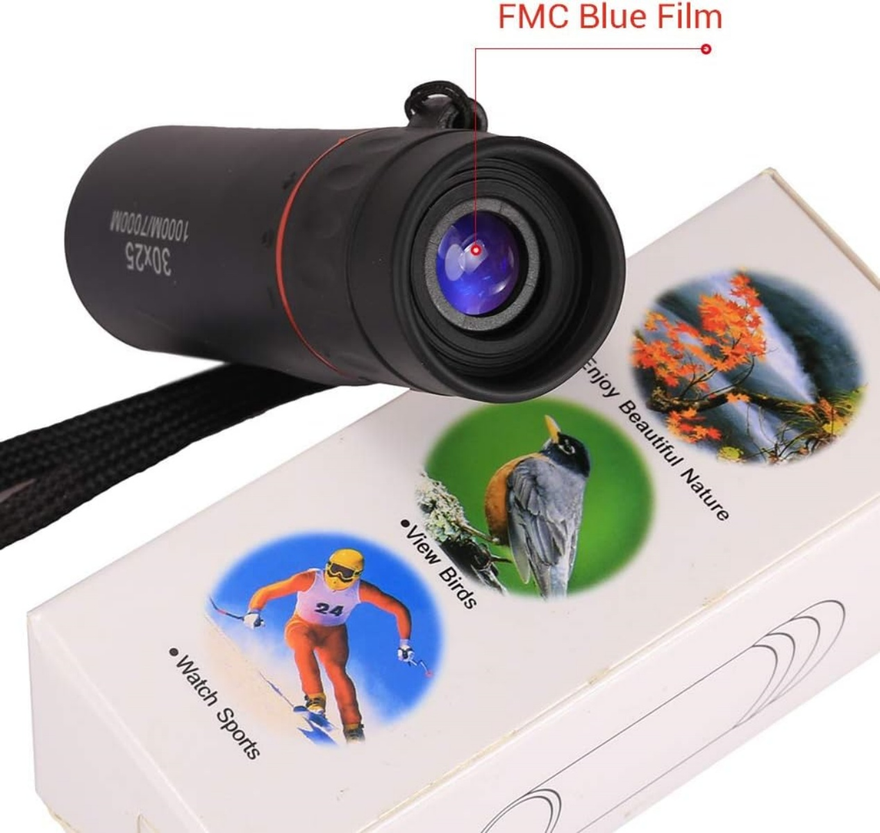 Ein Monokular mit FMC-Blaufilm, auf einer Box mit Bildern von Skifahrern und Vögeln.