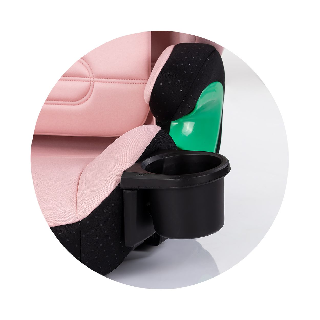 Ein rosafarbener Kindersitz mit schwarzem Getränkehalter und grünen Akzenten.