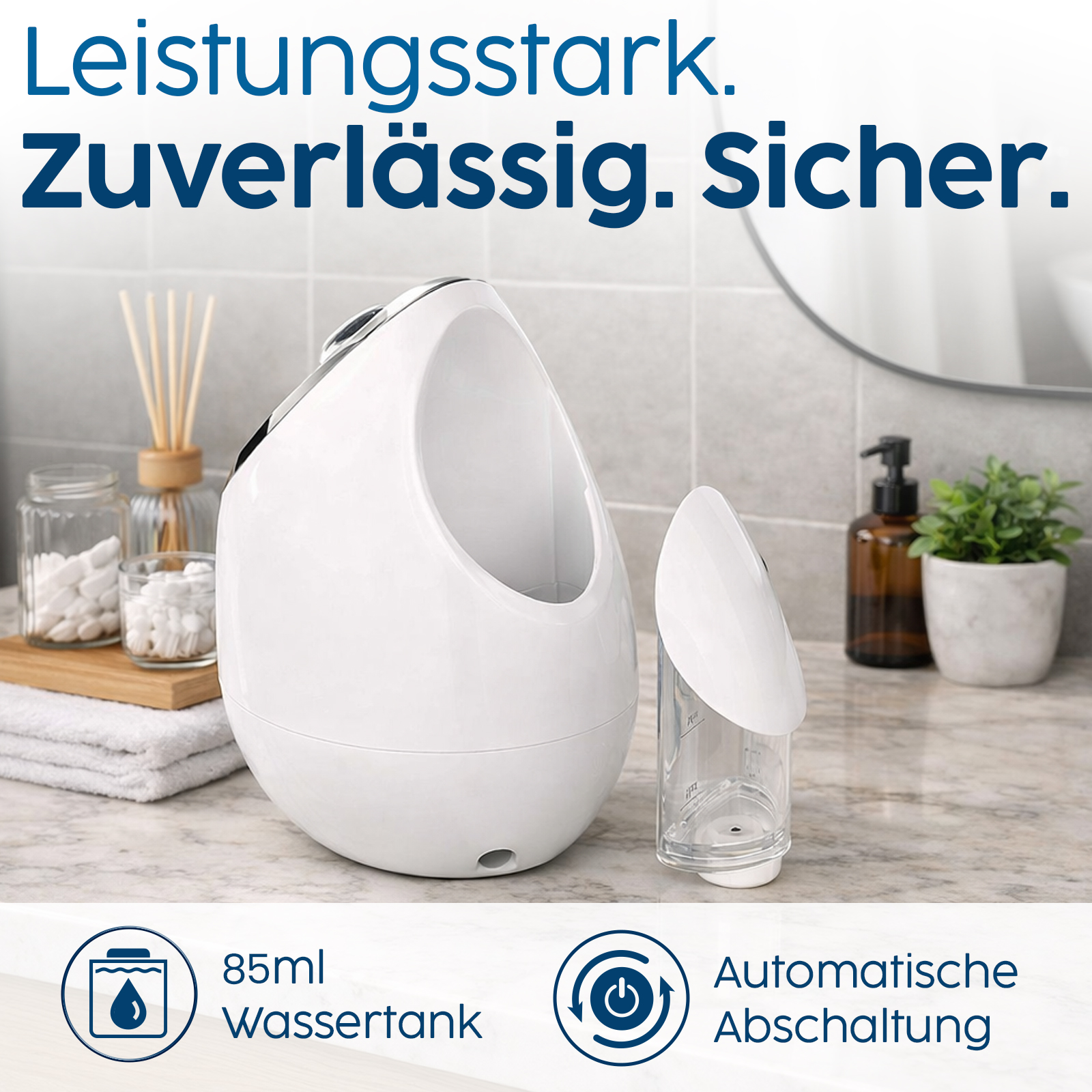 Ein weißer Verdampfer mit transparentem Behälter steht auf einer Marmoroberfläche.