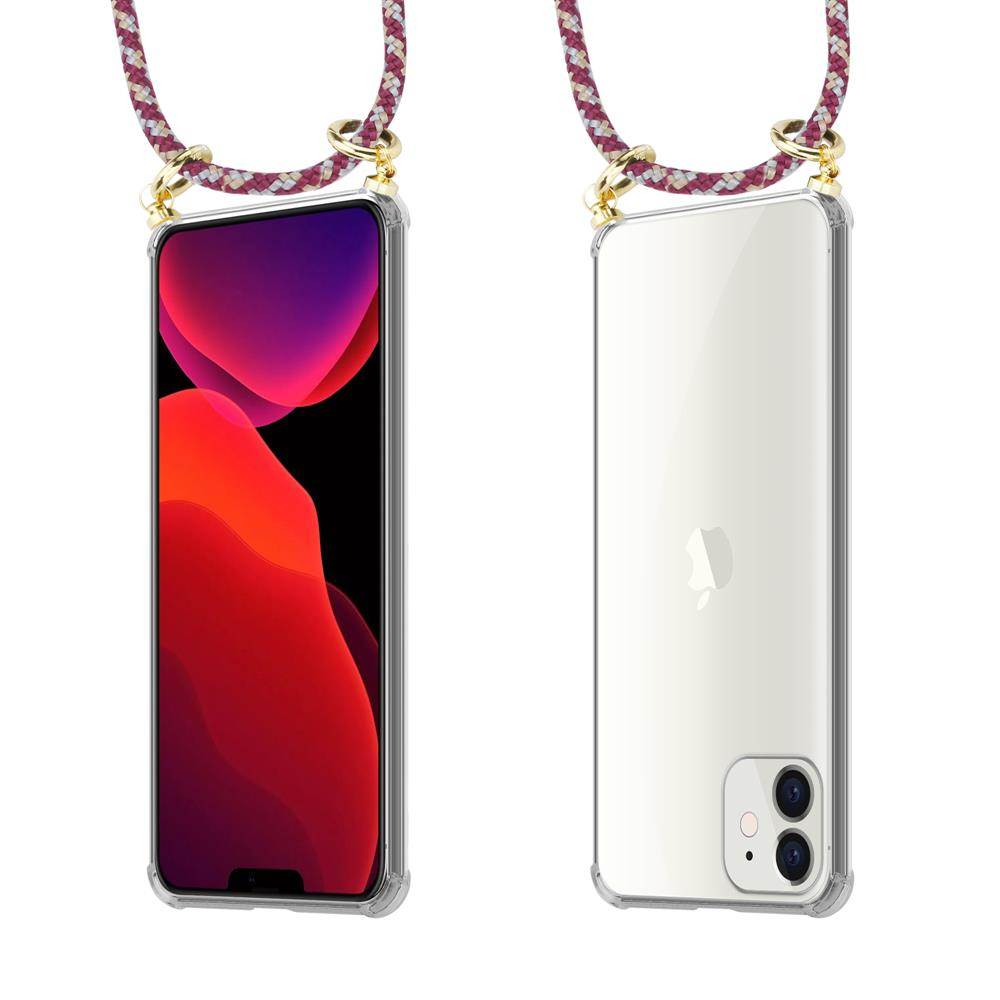 Una custodia trasparente per telefono con sfondo rosso e viola, attaccata a un cordone.