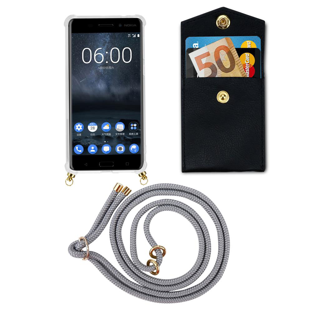 Ein Nokia-Handy mit Hülle, eine schwarze Kartenhaltertasche mit Geld und Karten, und eine graue Kordel.