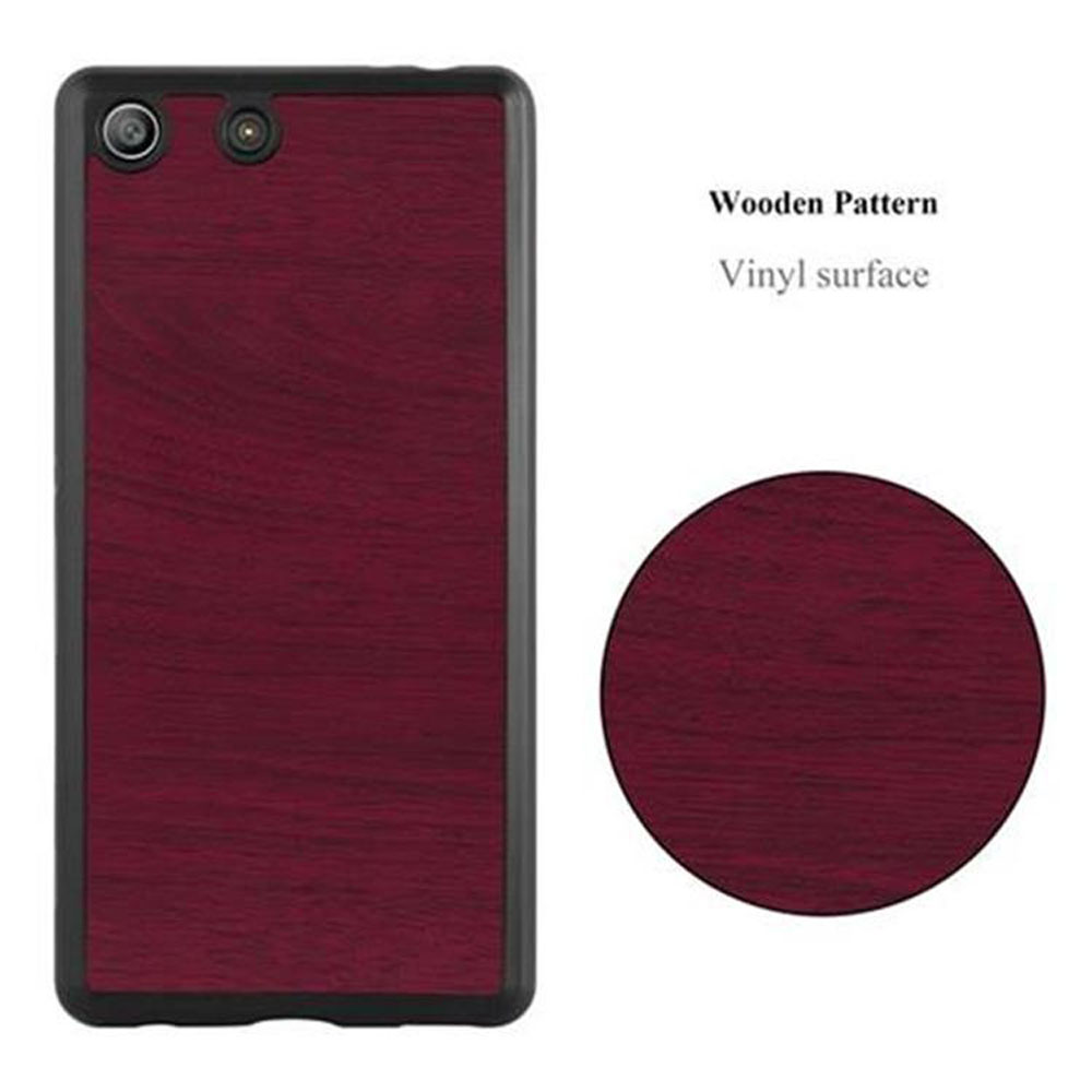 Funda roja para teléfono con veta de madera y círculo con el mismo patrón.