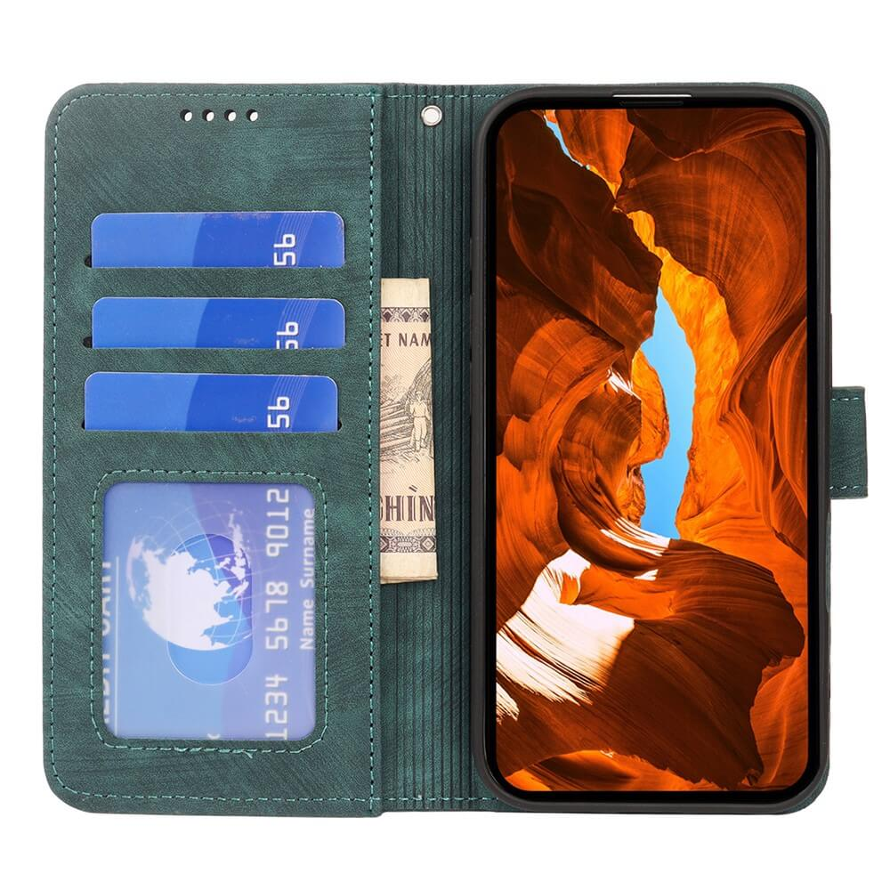 Grüne Brieftaschenhülle mit Kartenfächern und Handy mit Canyon-Bild.