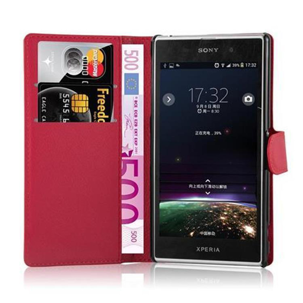 Custodia a portafoglio rossa con carte di credito, euro e un telefono Sony Xperia che mostra le 17:32.
