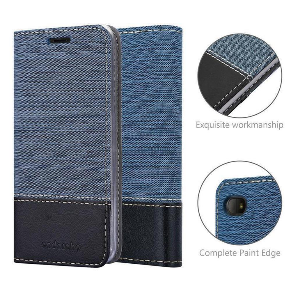 Custodia per telefono in tessuto blu con fondo in pelle nera. Mostra cuciture e ritagli.