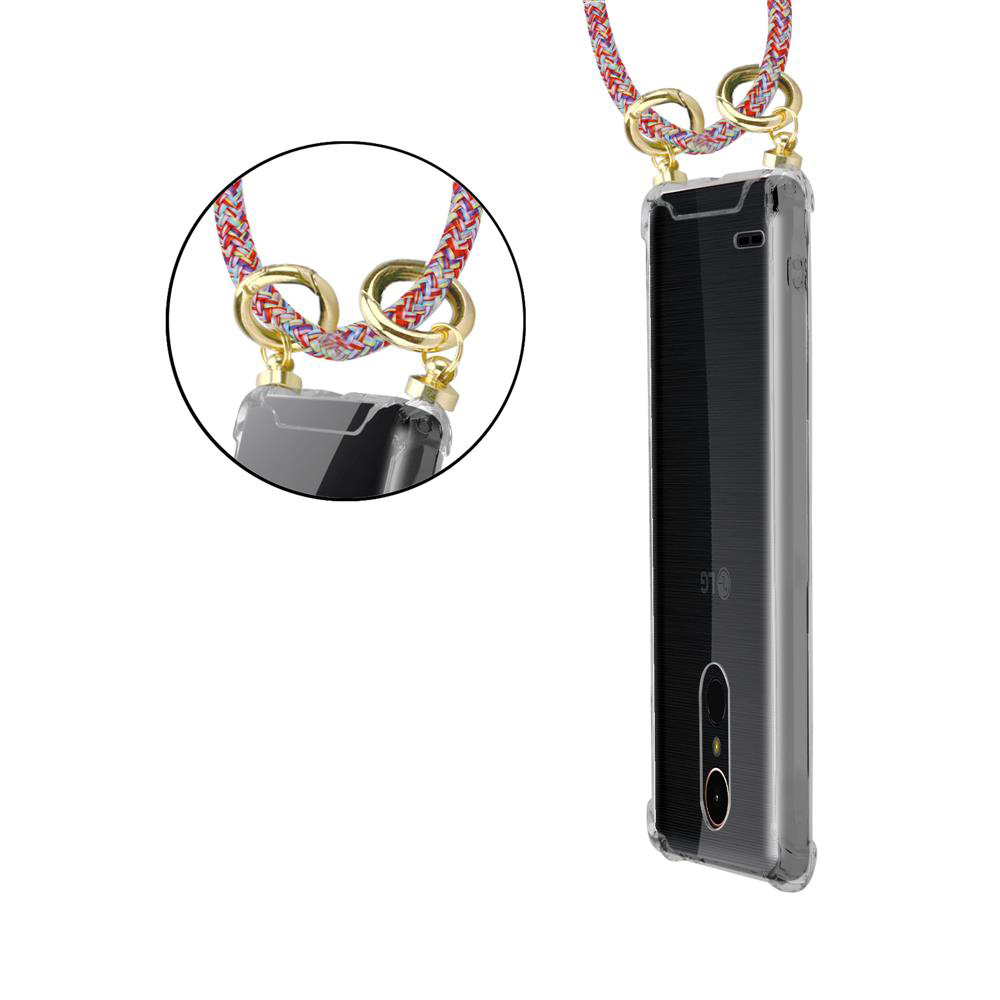 Ein durchsichtiges Handy mit buntem Band und goldenen Ringen, Nahaufnahme.