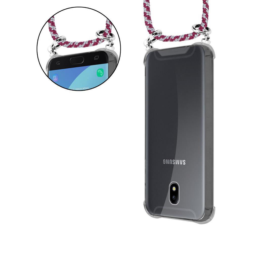 Ein durchsichtiges Samsung-Handy mit einem roten und weißen Band, das daran befestigt ist.
