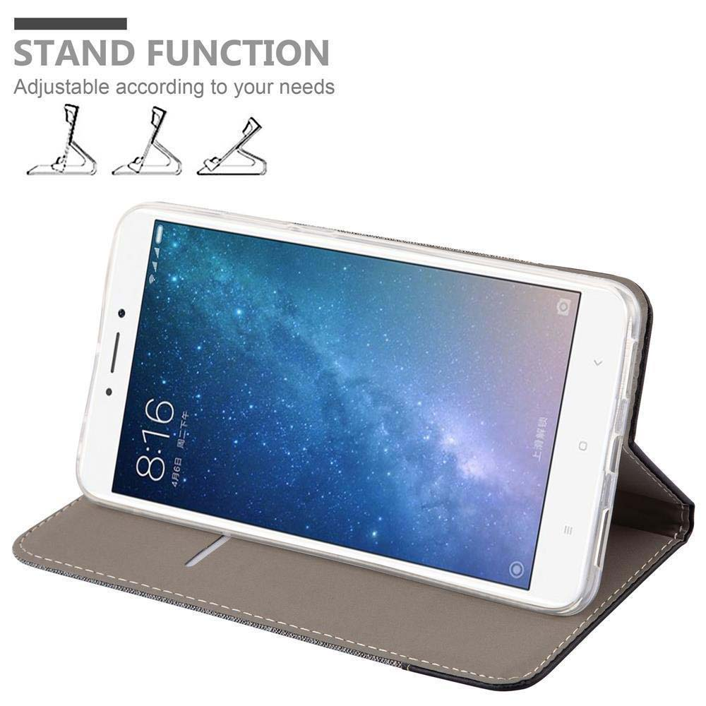 Uno smartphone in una custodia grigia con sfondo stellato e tre opzioni di supporto.