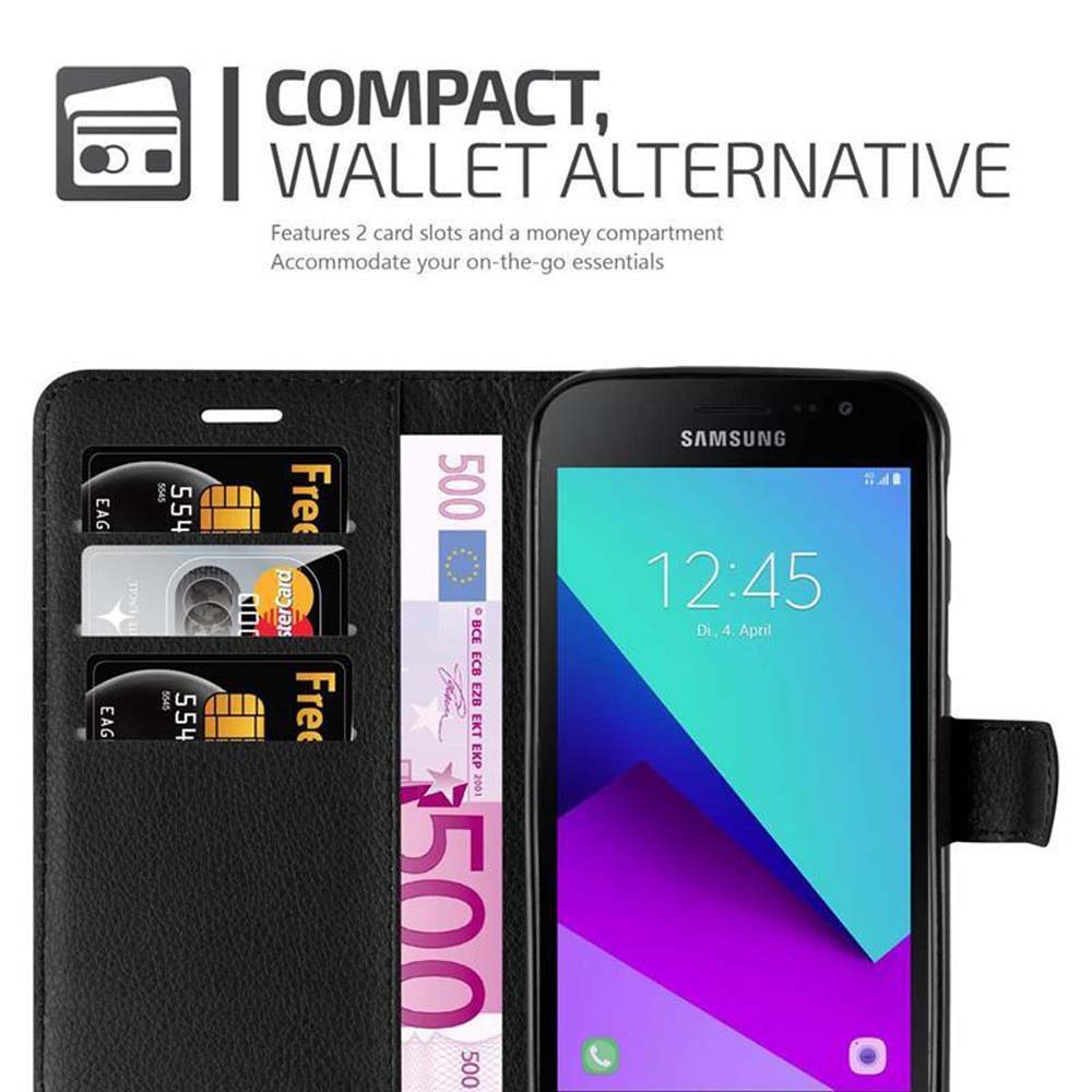 Portafoglio nero con telefono, carte e banconota da 500 euro.