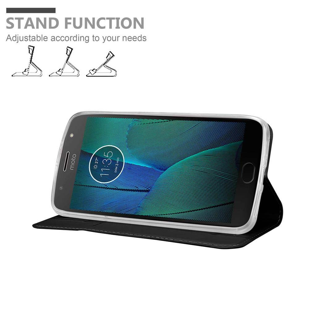 Uno smartphone in una custodia nera che funge da supporto.