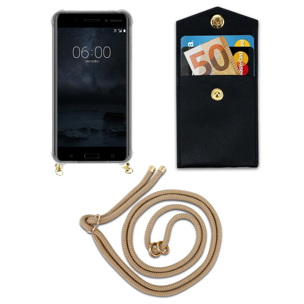 Ein Nokia-Smartphone mit einer Hülle, einer schwarzen Brieftasche mit Karten und Geld und einer Kordel.