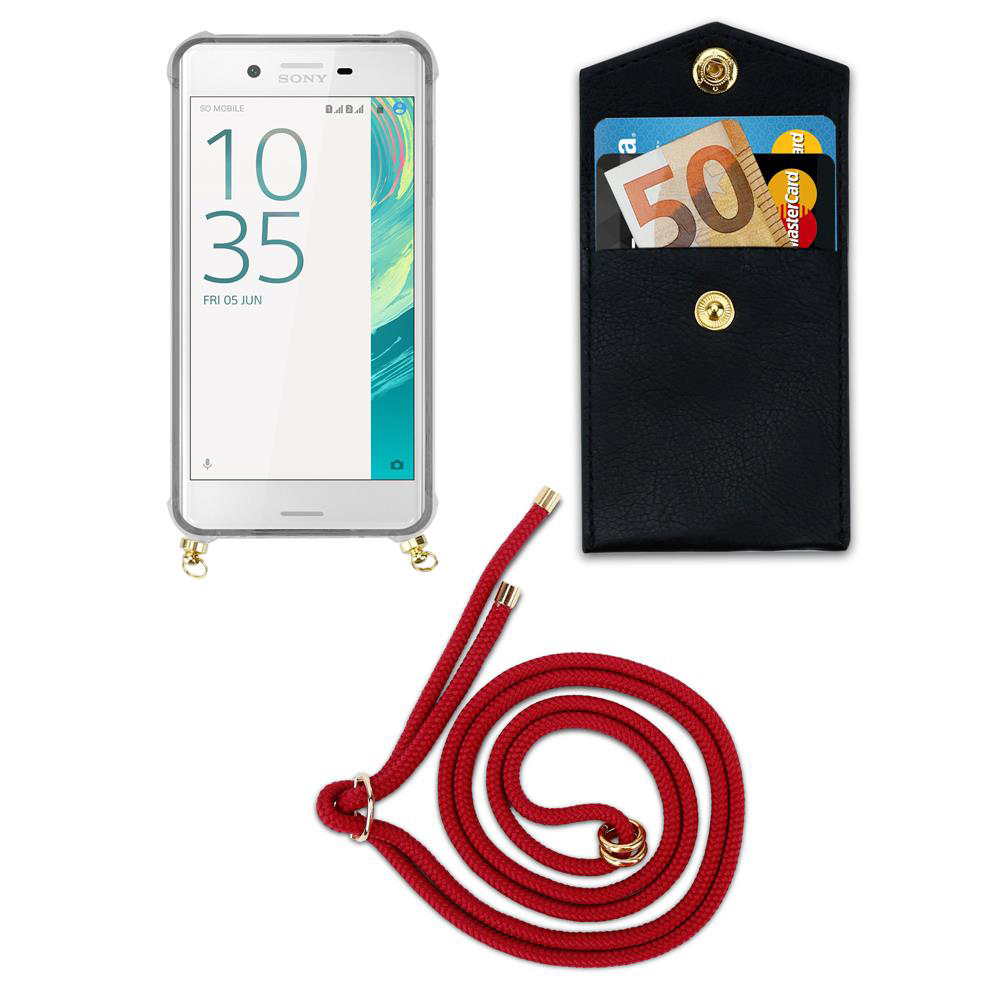 Ein Smartphone in einer Hülle mit einer roten Kordel und einer schwarzen Geldbörse mit Karten.