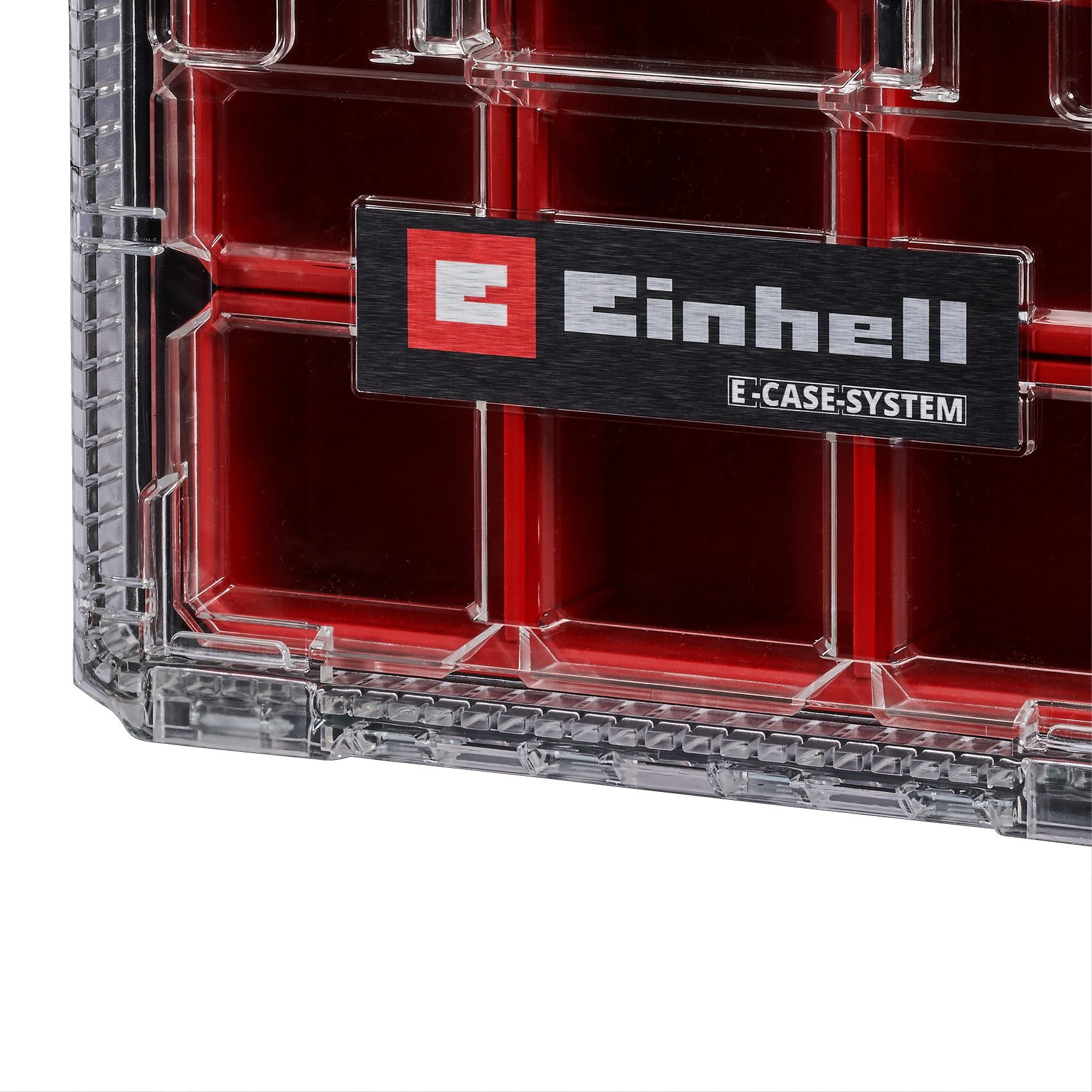Ein klares Aufbewahrungsbox mit roten Fächern und einem Einhell-Logo.