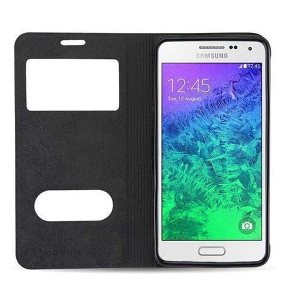 Un smartphone negro en una funda con ventana.