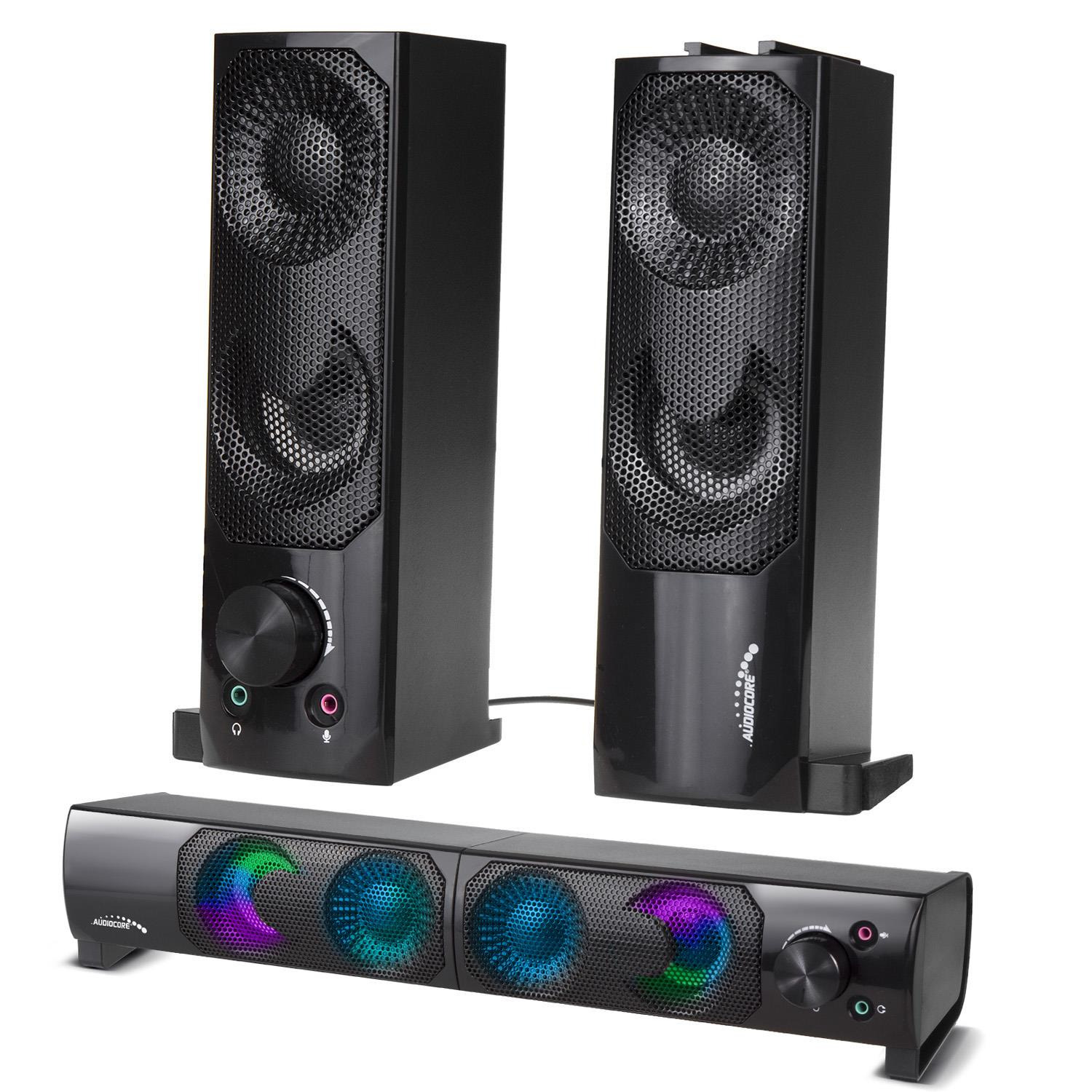 Dos altavoces negros y una barra de sonido con luces de colores.