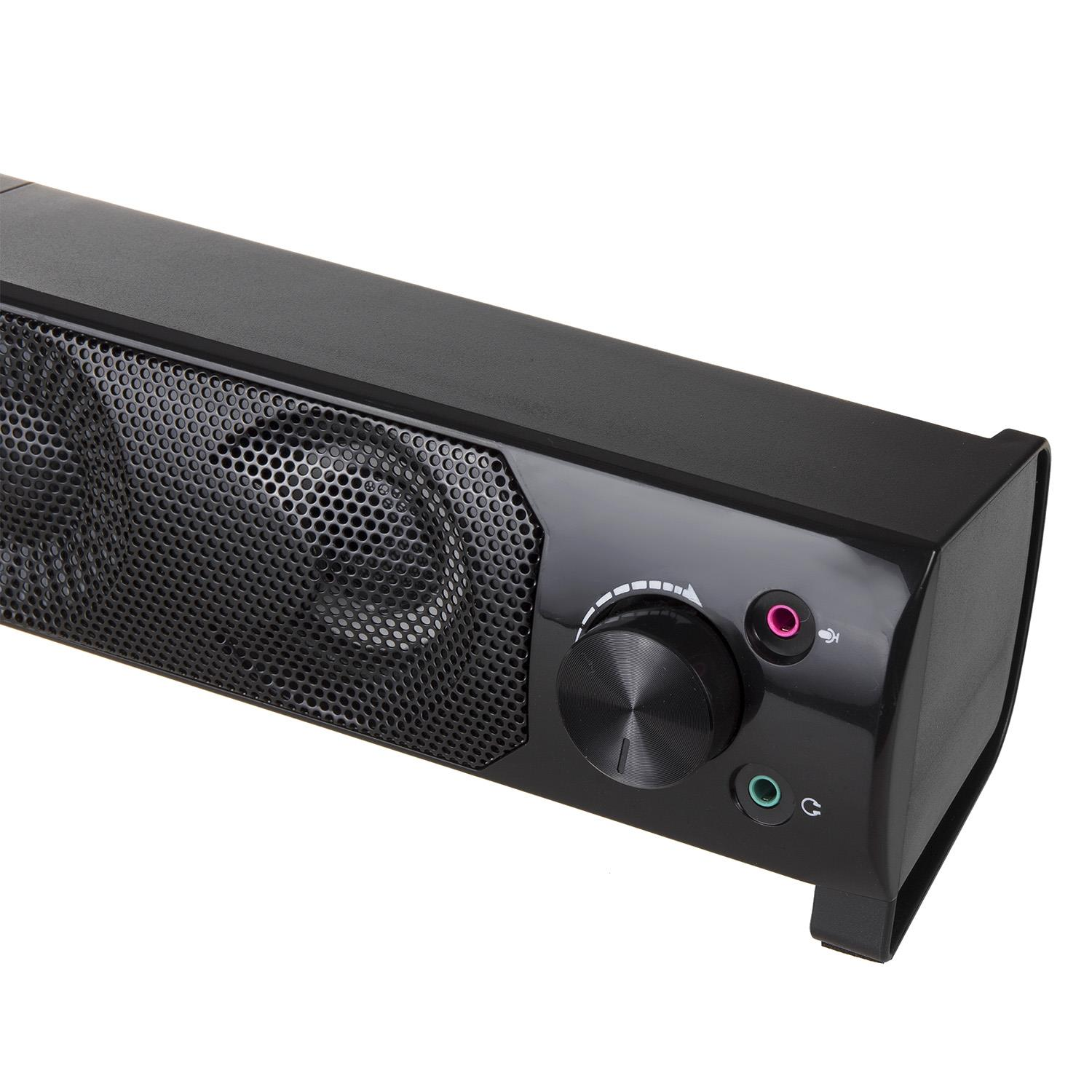 Altavoz negro con panel de control, perilla de volumen y puertos.