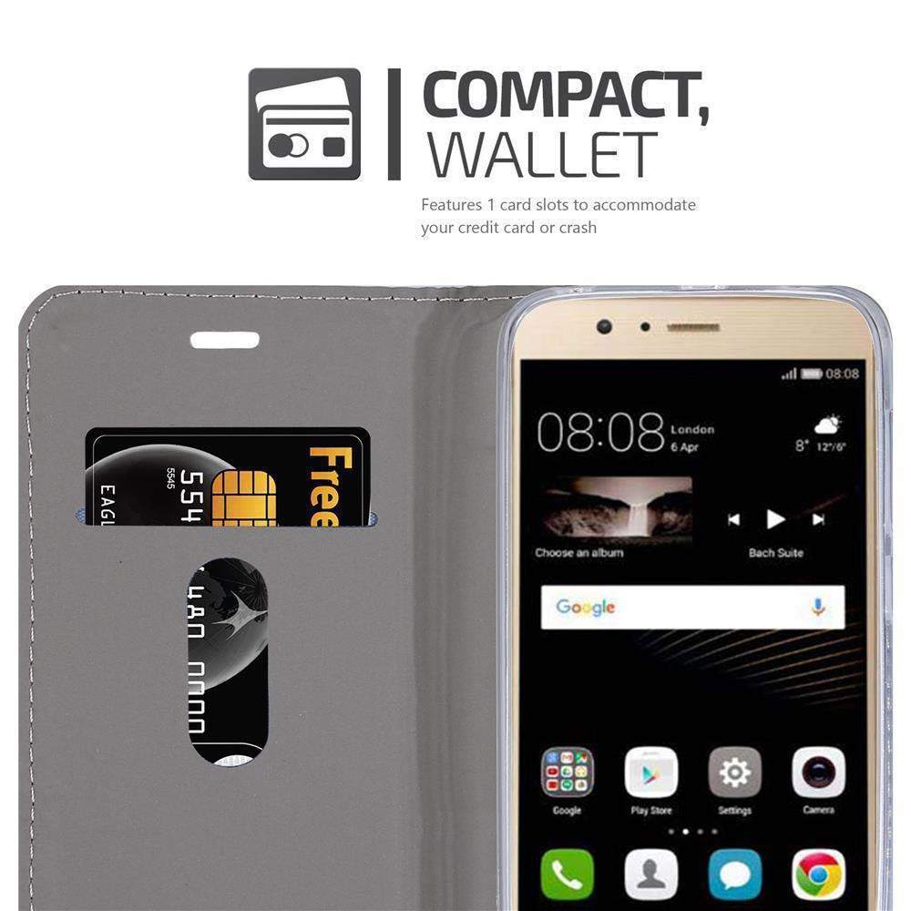 Uno smartphone in una custodia a portafoglio grigia. È visibile un chip di carta di credito.