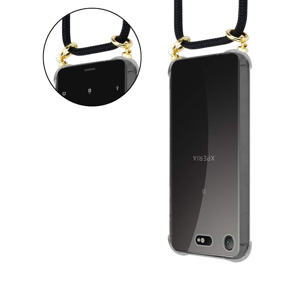 Telefon mit schwarzem Band und goldenen Verbindern, Vorder- und Rückseite gezeigt.