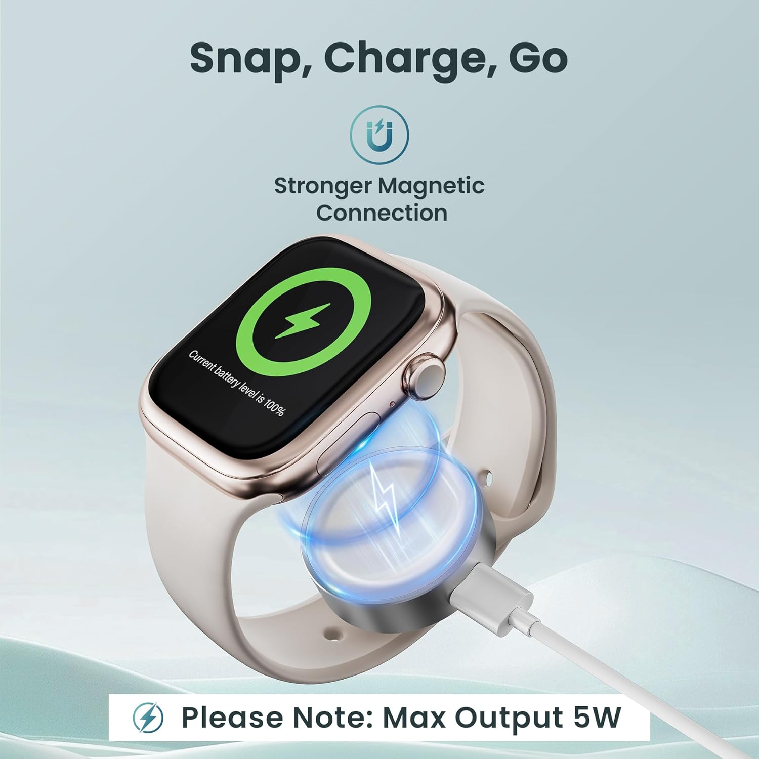 Eine goldene Smartwatch wird magnetisch geladen, Akku 100%.