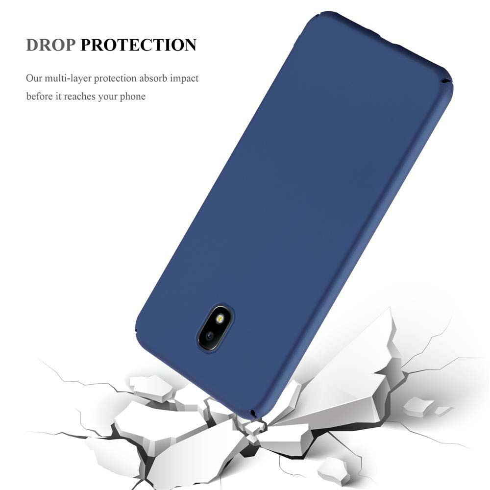 Cover blu scuro rompe superficie bianca, mostrando protezione caduta.