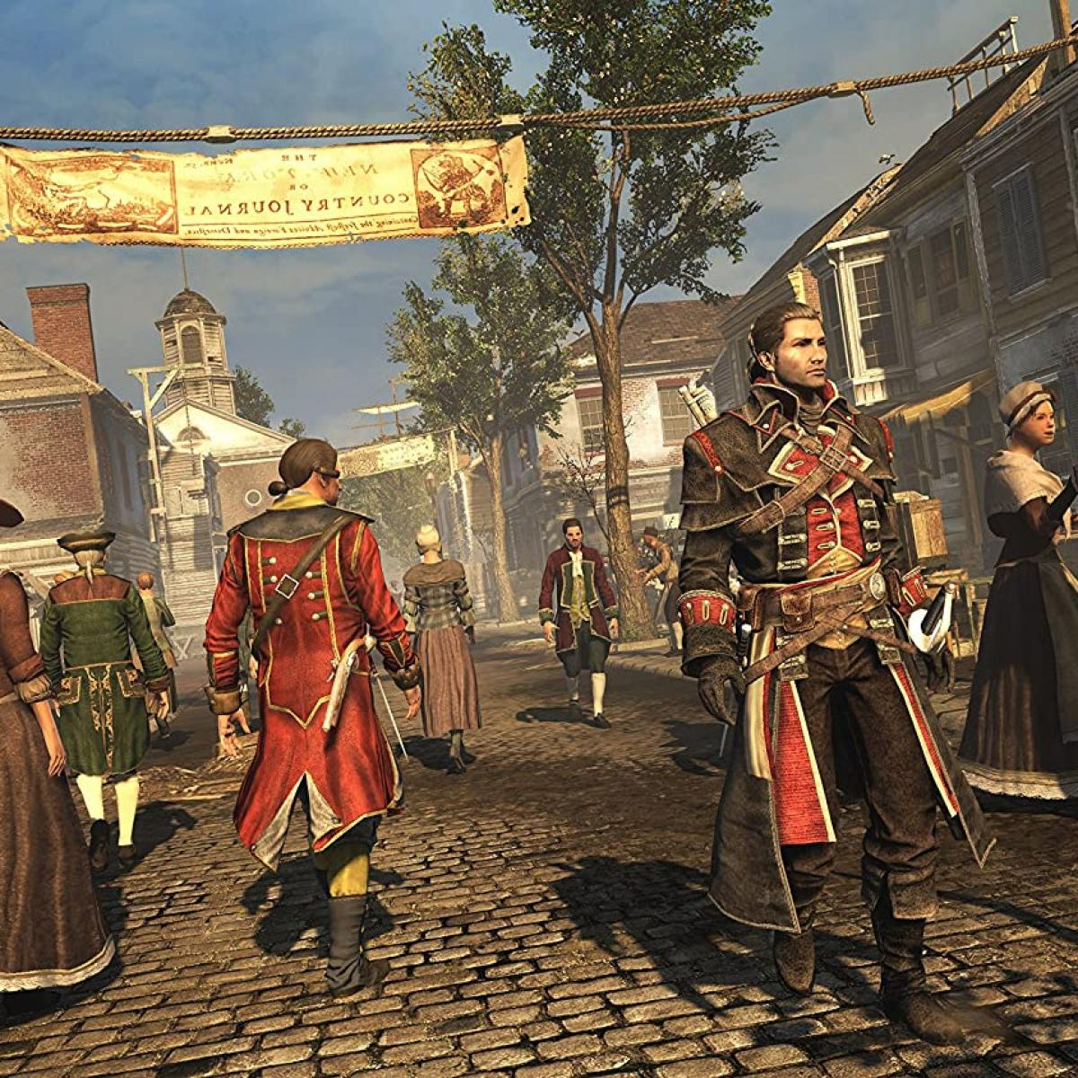 Mężczyźni w strojach historycznych idą brukowaną ulicą. Nad nimi wisi baner.