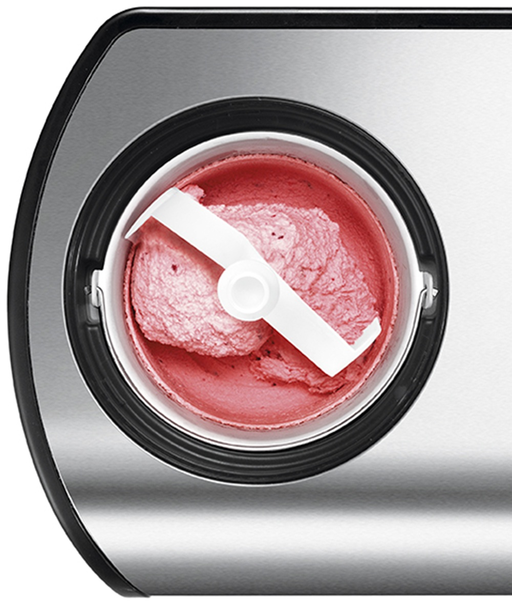 Una máquina de helados con una pala blanca mezclando helado rosa.
