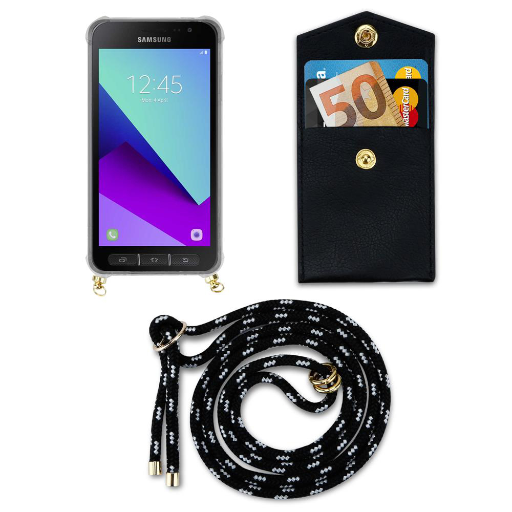 Uno smartphone Samsung con custodia, portafoglio nero con carte e denaro, e un cordino.