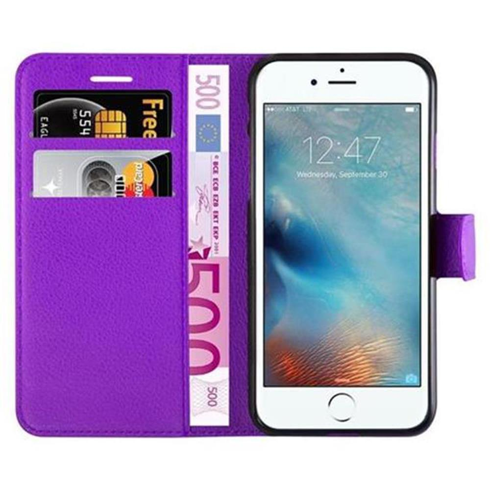 Custodia viola con smartphone, carte di credito e banconota da 500 euro.