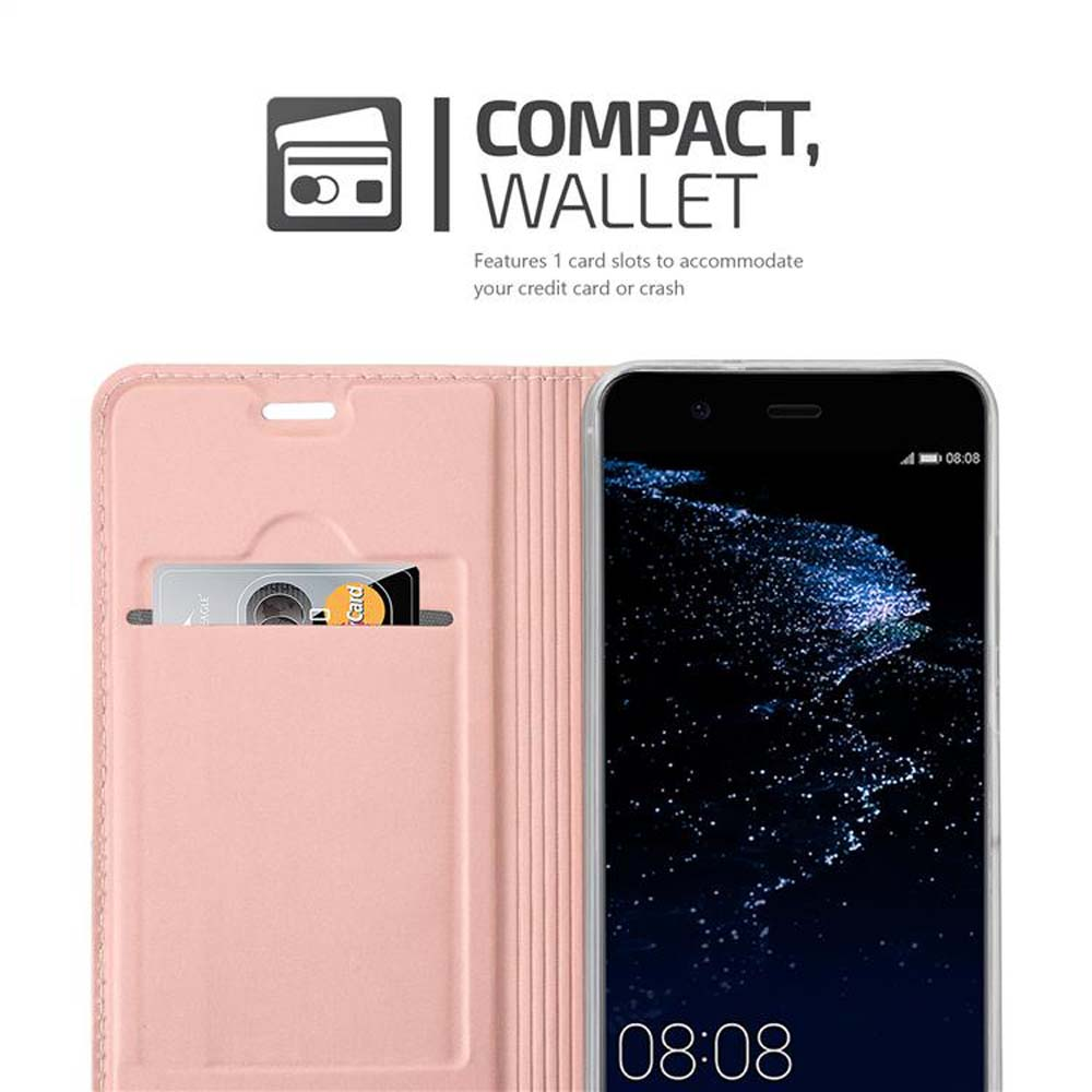 Una custodia a portafoglio rosa con una carta e uno smartphone che mostra la schermata principale.