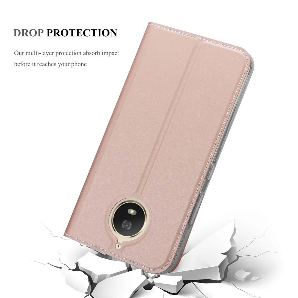 Custodia per telefono oro rosa con ritaglio fotocamera, su superficie bianca incrinata.