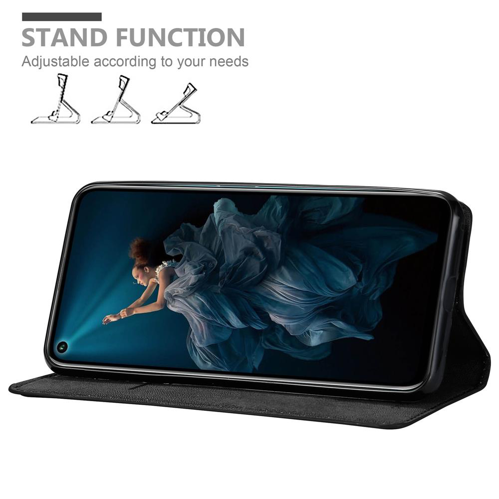 Uno smartphone in una custodia nera che funge da supporto. Lo schermo mostra una donna.