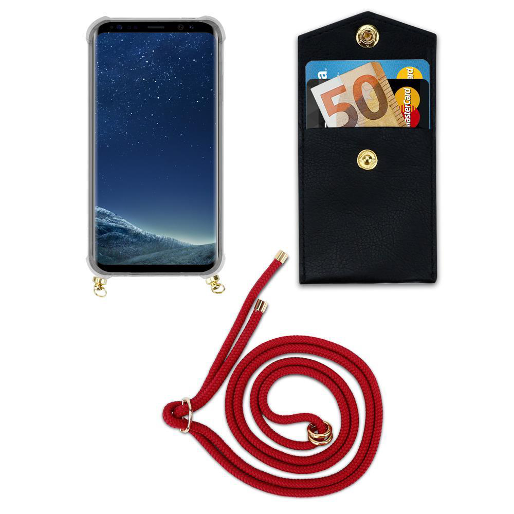 Bustina nera con banconota euro e carte, accanto a smartphone e cordino rosso.
