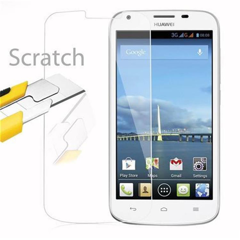 Protezione schermo su smartphone con taglierino accanto.