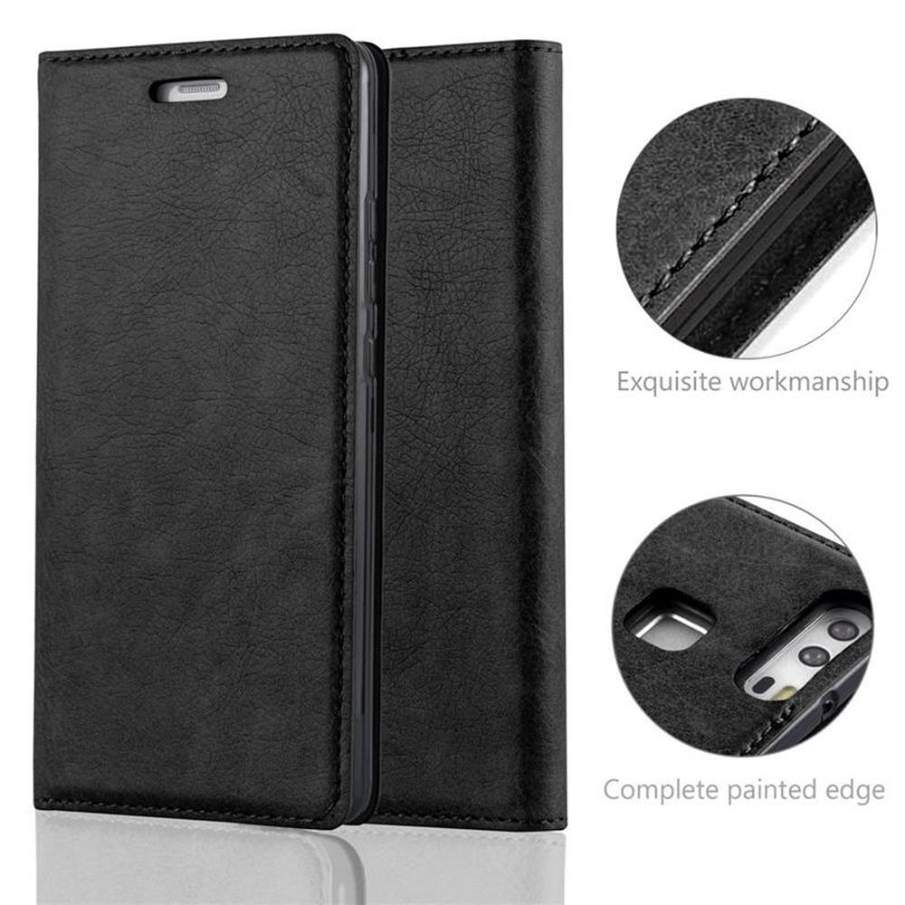 Funda de cuero negra con artesanía y bordes detallados.