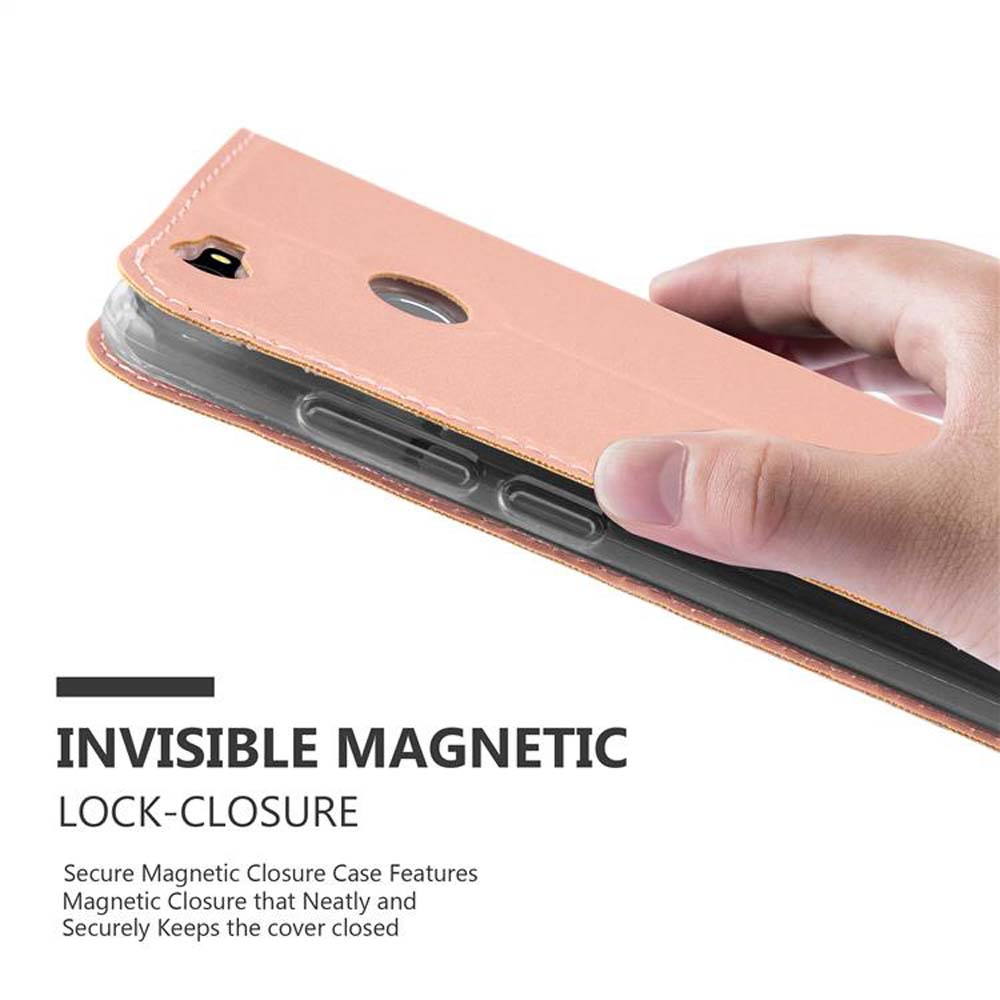 Una custodia per telefono rosa con chiusura magnetica tenuta da una mano.