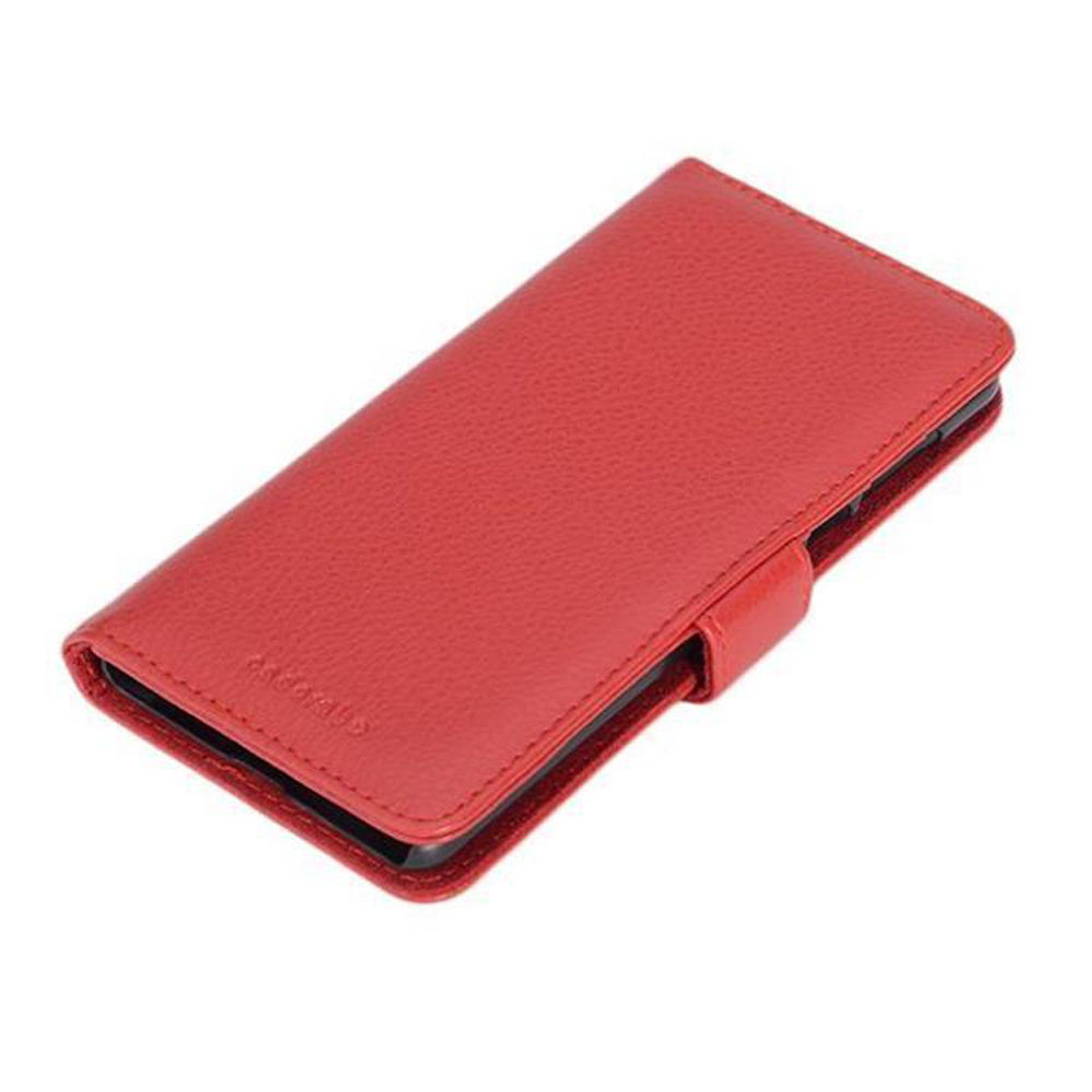 Custodia rossa in pelle a libro, chiusa su sfondo bianco.