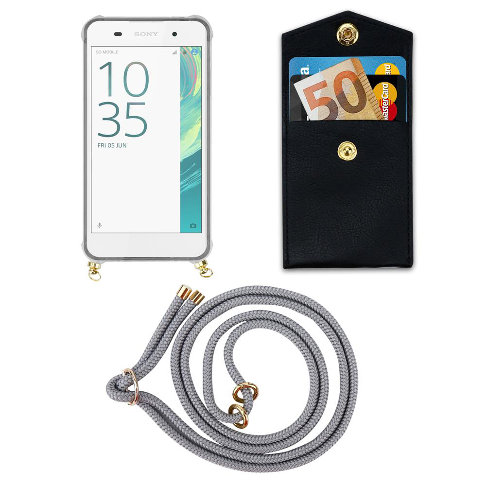 Ein Smartphone mit einer Hülle, einer schwarzen Tasche mit Geld und Karten und einer grauen Kordel.