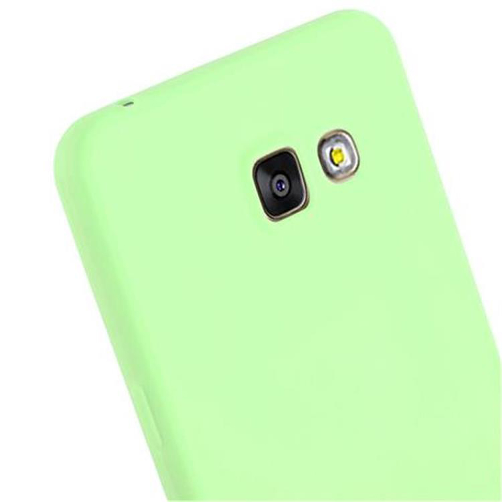 Retro di uno smartphone verde chiaro con fotocamera e flash.
