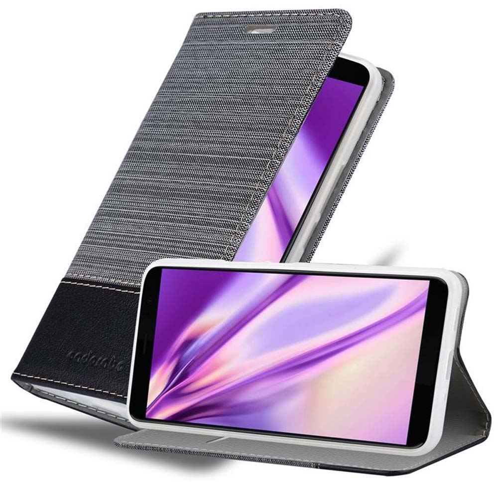 Un telefono cellulare grigio in una custodia a libro.
