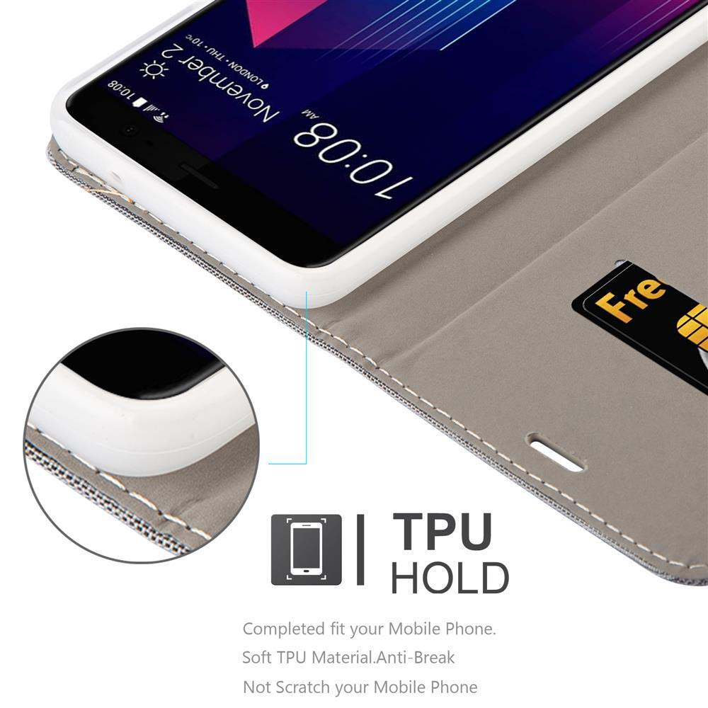 Uno smartphone in una custodia grigia con una carta di credito.