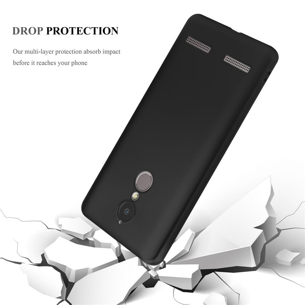 Cover nera per telefono che cade su terreno incrinato, mostrando protezione.
