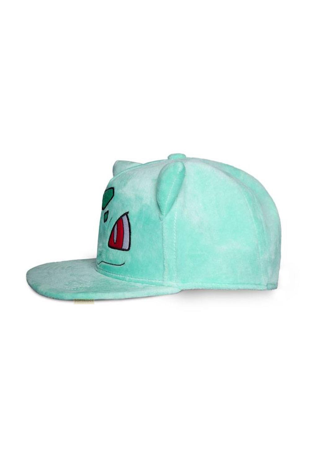 Ein mintgrüner Plüschhut mit Bulbasaur-Gesicht und roten Augen.