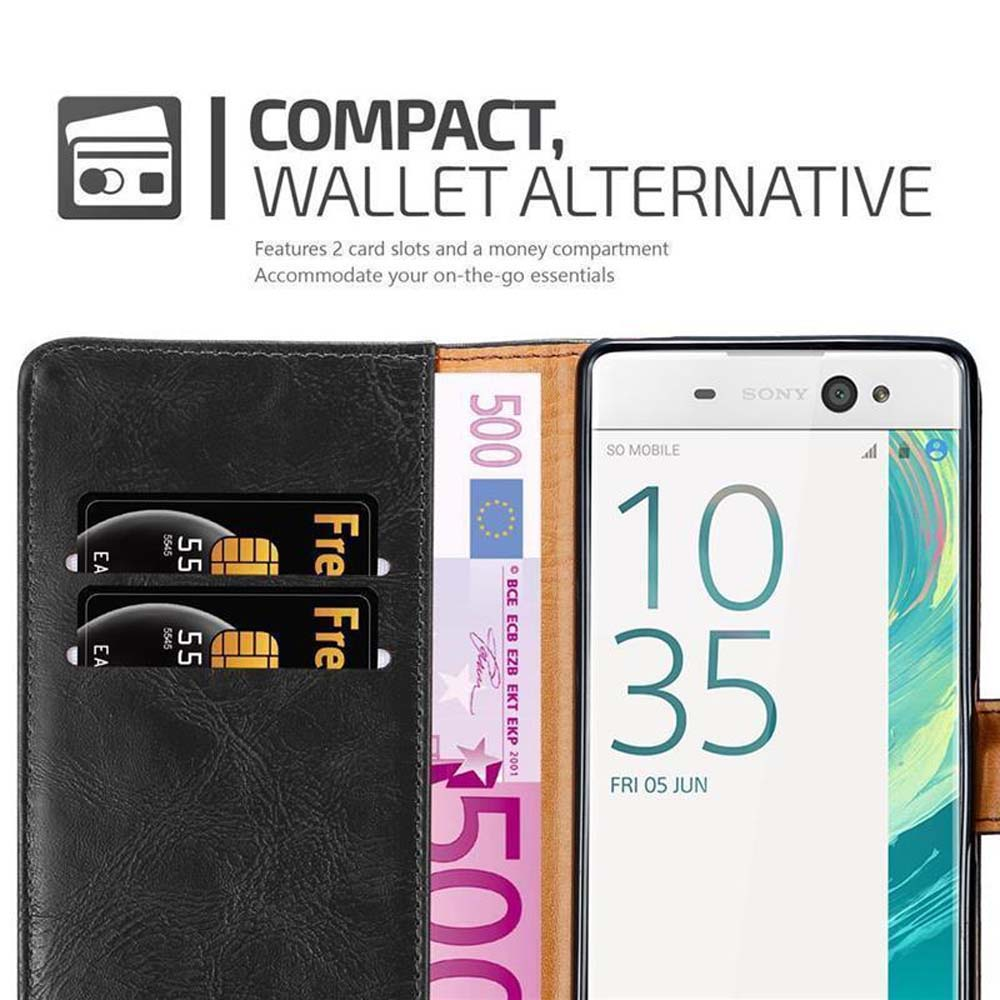 Portafoglio nero con telefono, banconote e fessure per carte.