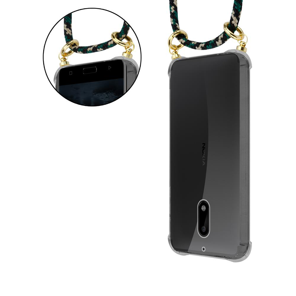 Ein durchsichtiger Kasten schützt ein Nokia-Telefon mit einem bunten Band.