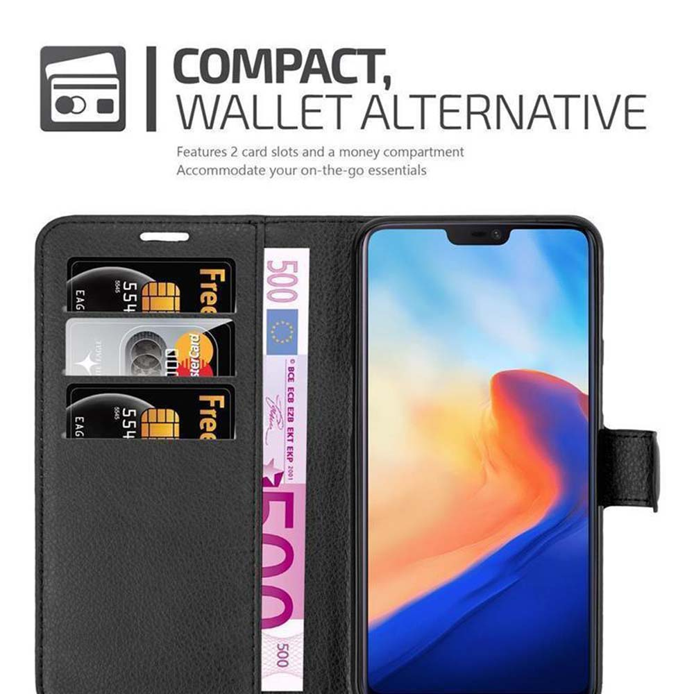 Portafoglio nero con telefono, carte e banconota da 500 euro.
