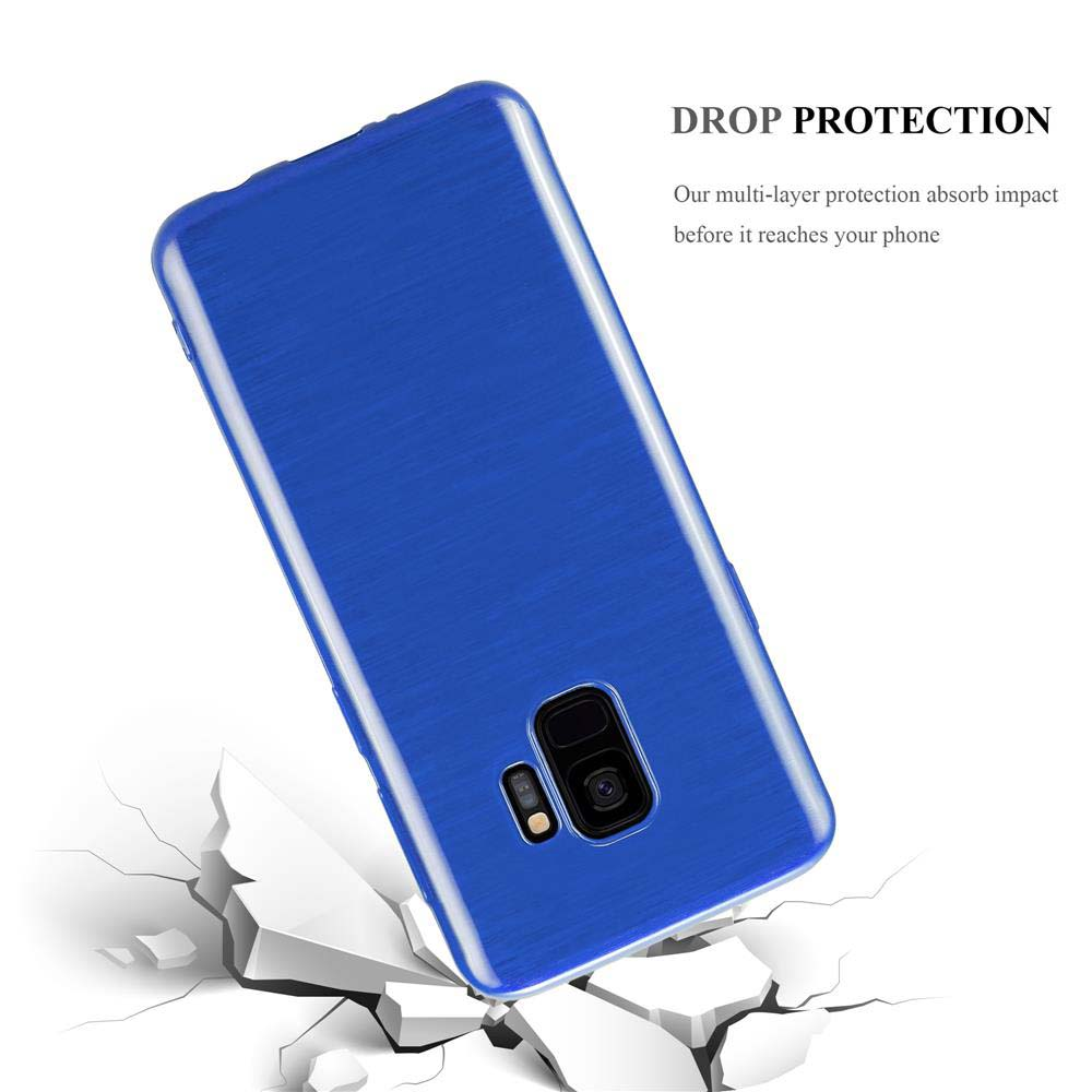 Una cover blu per telefono cade e rompe superfici bianche.