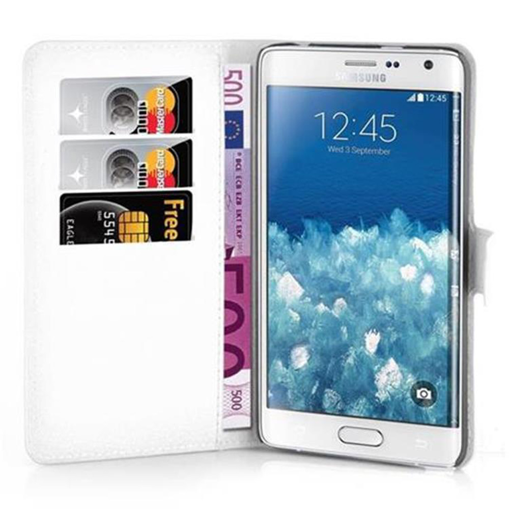 Un portafoglio bianco con slot per carte e uno smartphone. Ci sono anche banconote da 500 euro.