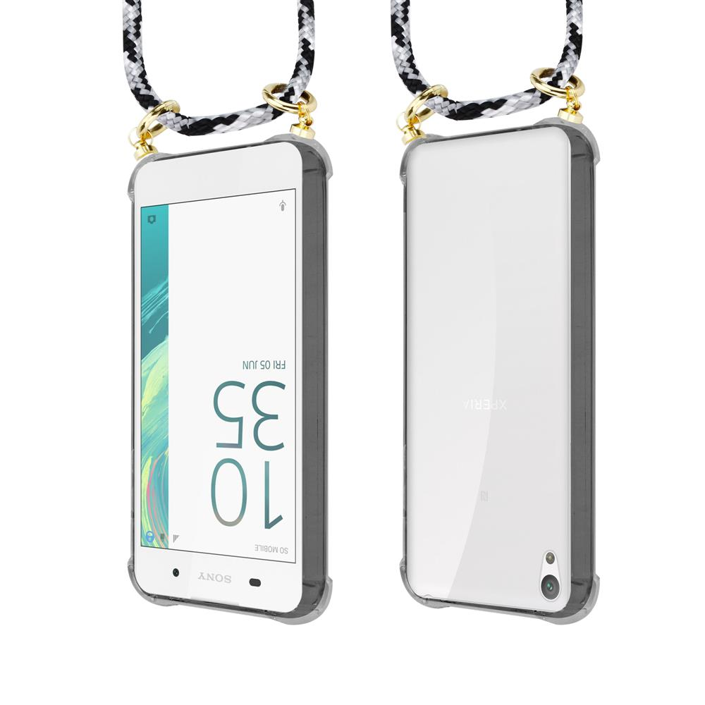 Zwei weiße Smartphones mit schwarzem und weißem Band, das an ihnen befestigt ist.